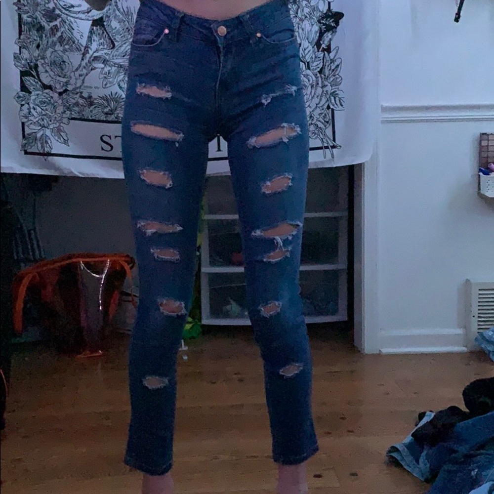 blue ripped jeans